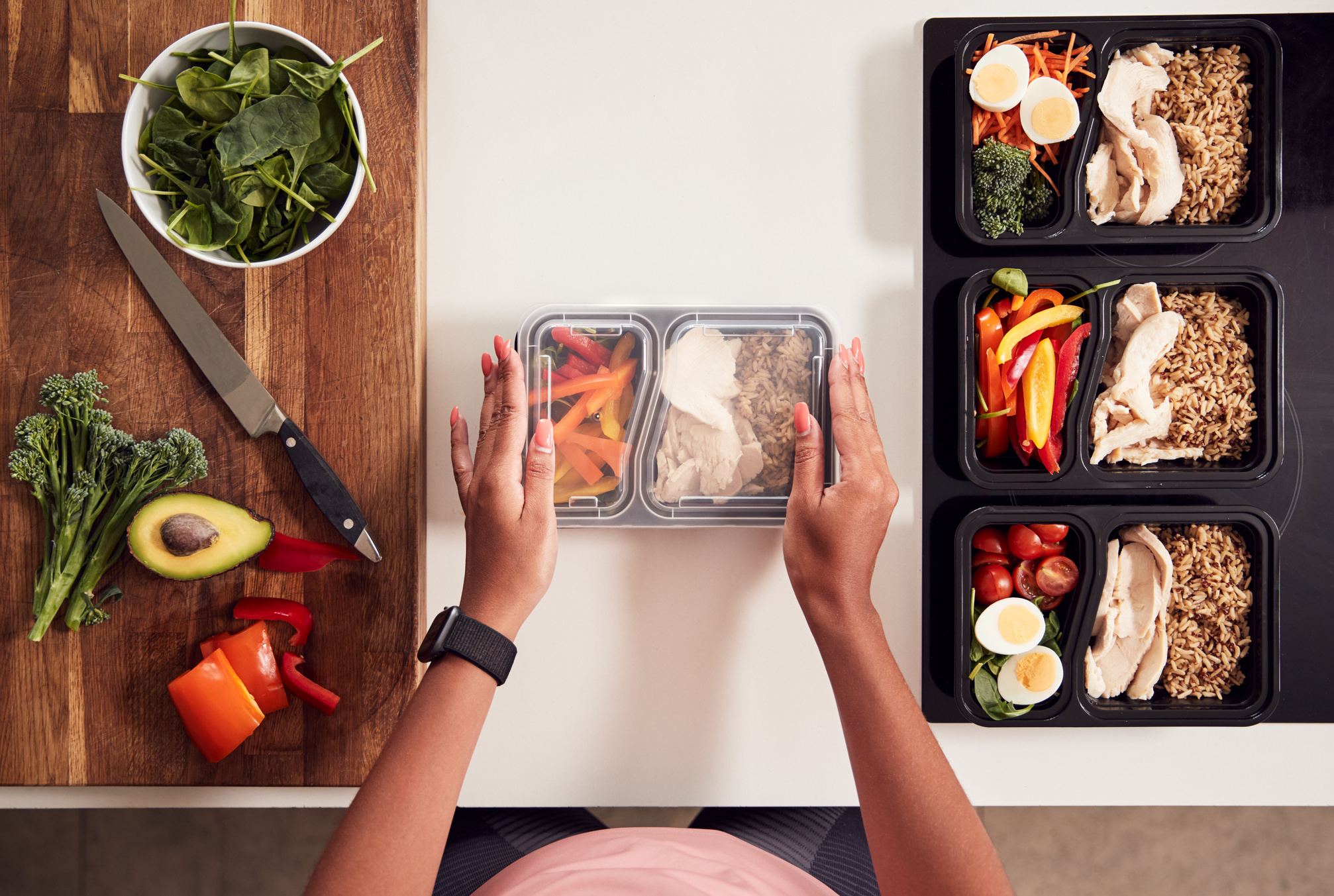 Woman Preparing Batch of Healthy Meals